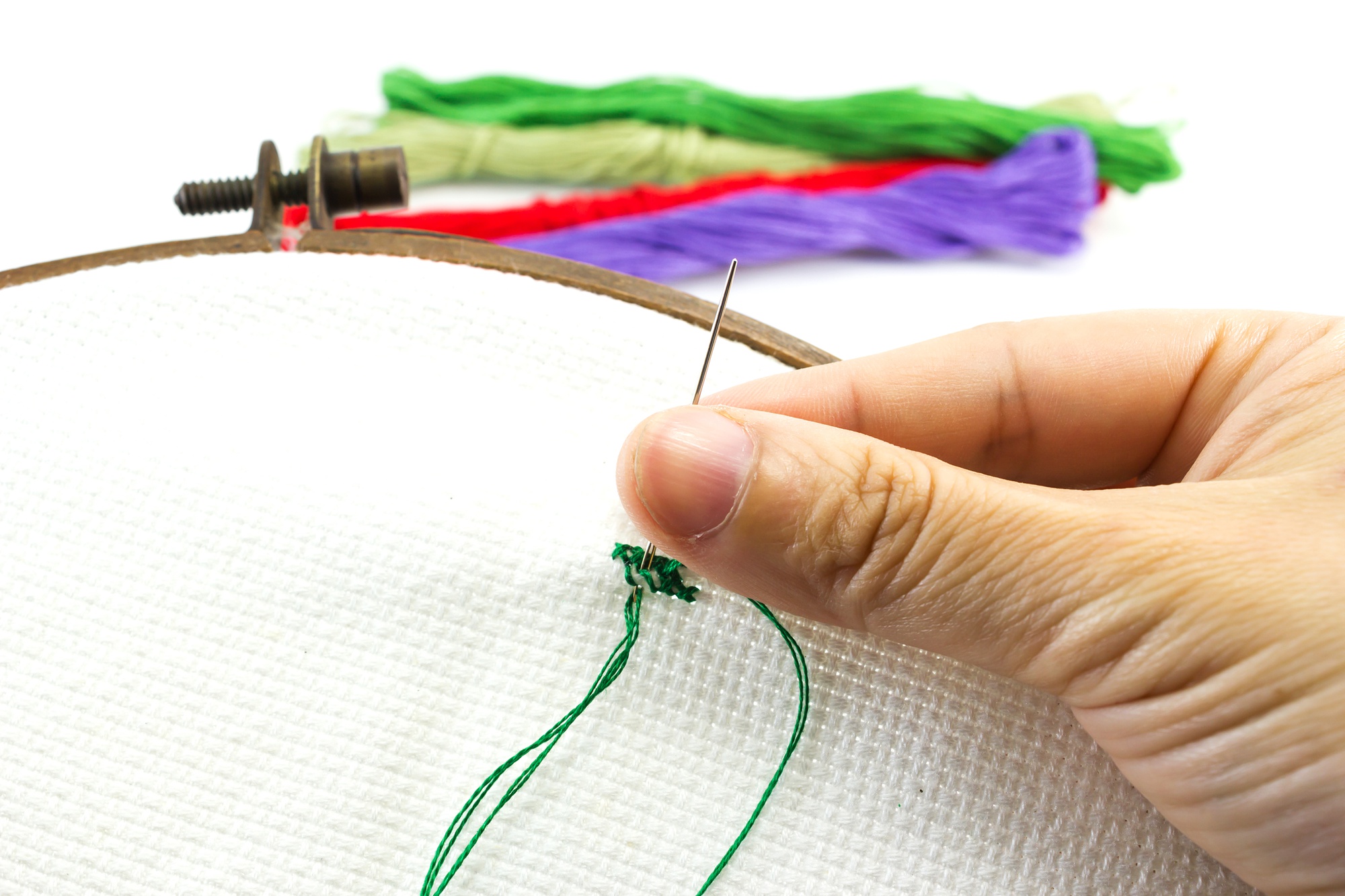 close-up of artisan hand embroidery on fabric