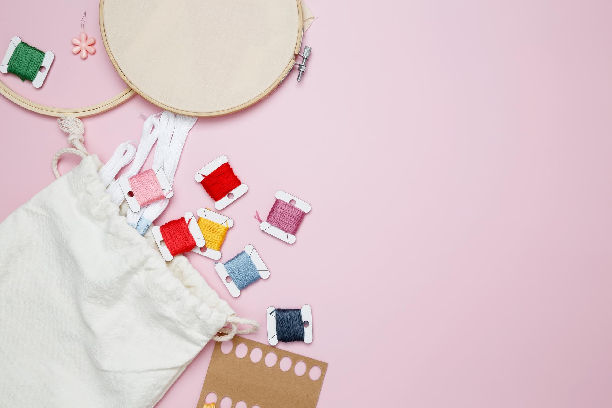 sample pricing mood with embroidered swatches and thread